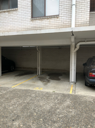 Private covered parking spot close to CBD