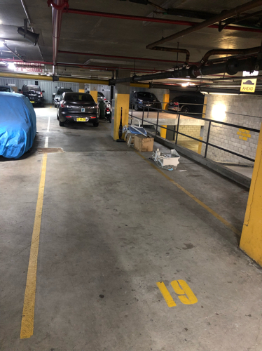 Tandem car spot in security garage. Monthly rental