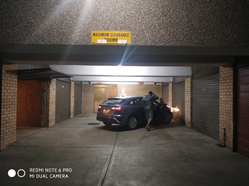 Sedan parking at the foot of Westfield Parramatta