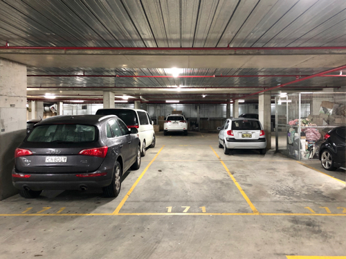 Indoor parking spot adjacent to James Ruse Drive