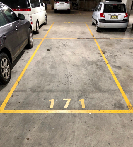 Indoor parking spot adjacent to James Ruse Drive
